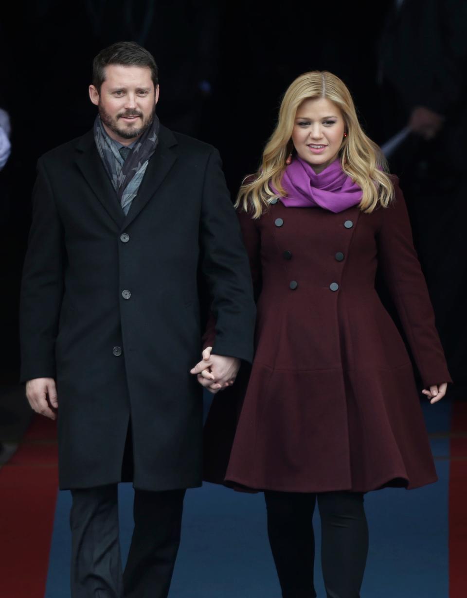 Kelly Clarkson, right, has won another legal battle in her divorce from ex-husband Brandon Blackstock.