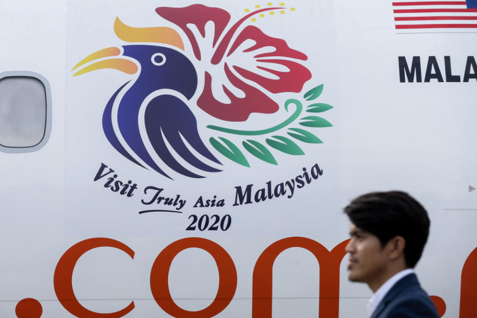 The Visit Malaysia Year 2020 logo is seen on an aircraft at the Bunga Raya Complex, Sepang July 22, 2019. — Picture by Ahmad Zamzahuri