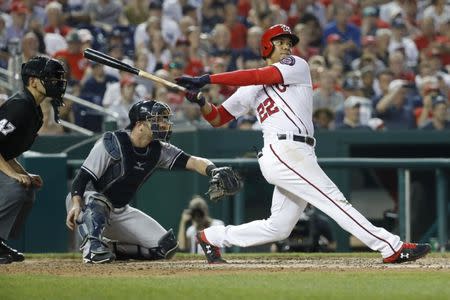 Jun 18, 2018; Washington, DC, USA; Washington Nationals right fielder Juan Soto (22) singles against the New York Yankees in the sixth inning at Nationals Park. Mandatory Credit: Geoff Burke-USA TODAY Sports