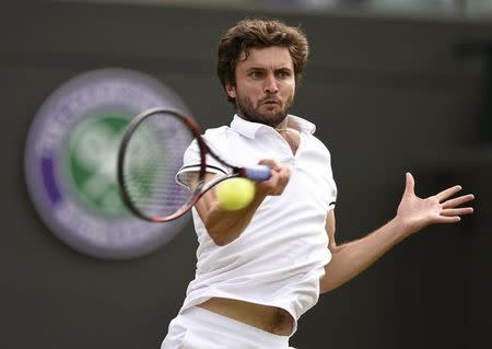 Britain Tennis - Wimbledon - All England Lawn Tennis & Croquet Club, Wimbledon, England - 30/6/16 France's Gilles Simon in action against Bulgaria's Grigor Dimitrov REUTERS/Tony O'Brien