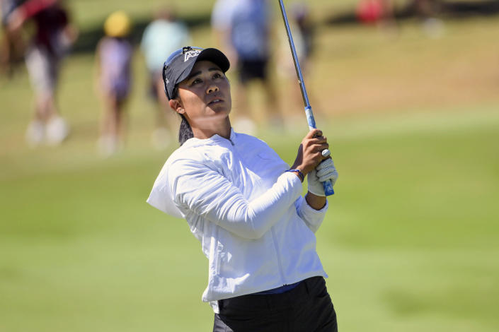Danielle Kang, of the United States, watches her shot on the 16th hole during the final round of the LPGA Walmart NW Arkansas Championship golf tournament, Sunday, Sept. 25, 2022, in Rogers, Ark. (AP Photo/Michael Woods)