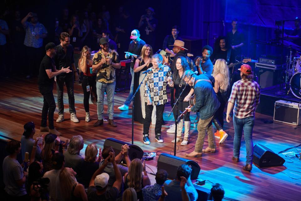 <p>Randy Travis, moments before the crowd erupted at his resounding "amen" to close out his iconic country song, "Forever and Ever Amen," at The Mother Church of Country Music, the historic Ryman Auditorium. </p>