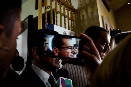 Pedro Pierluisi is surrounded by media during a special session of the Legislative Assembly in San Juan