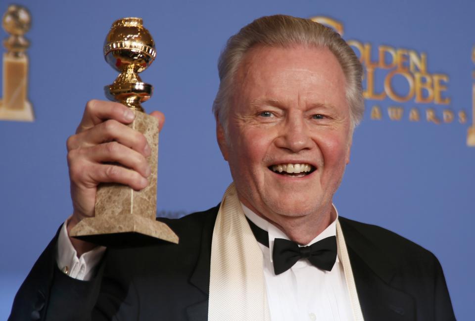 Jon Voight poses backstage with his award for Best Supporting Actor in a Series, Mini-Series or TV Movie for his role in "Ray Donovan" at the 71st annual Golden Globe Awards in Beverly Hills