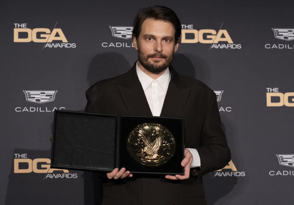 Sam Levinson poses in the press room with the award for outstanding directorial achievement in a dramatic series for "Euphoria" at the 75th annual Directors Guild of America Awards on Saturday, Feb. 18, 2023, at the Beverly Hilton hotel in Beverly Hills, Calif. (AP Photo/Chris Pizzello)