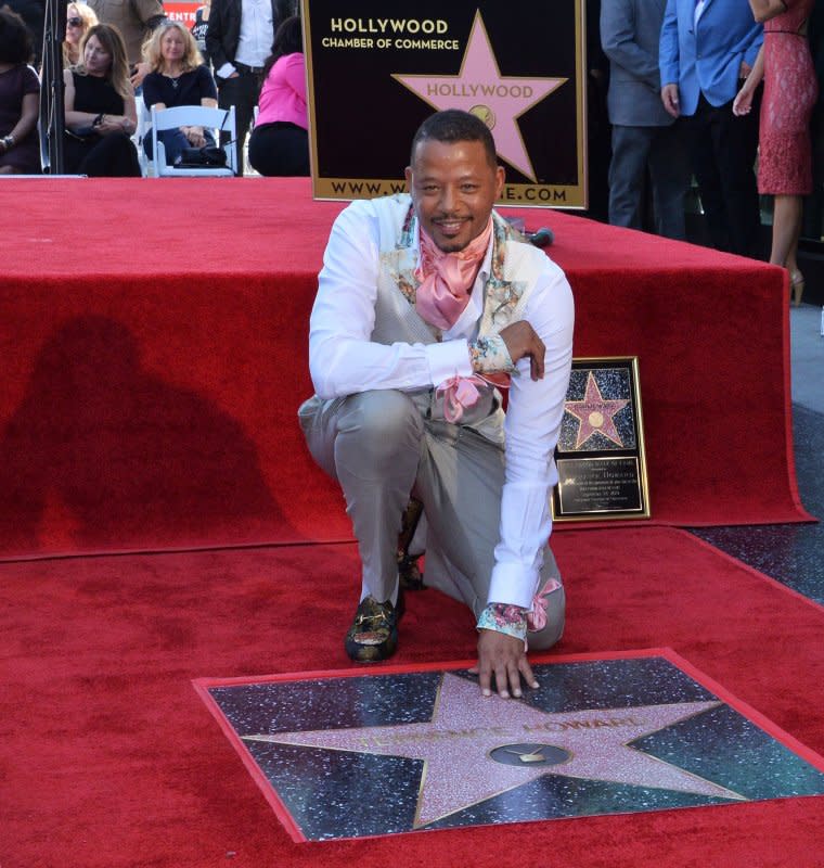 Terrence Howard touches his star during an unveiling ceremony on the Hollywood Walk of Fame in Los Angeles on September 24, 2019. The actor turns 55 on March 11. File Photo by Jim Ruymen/UPI