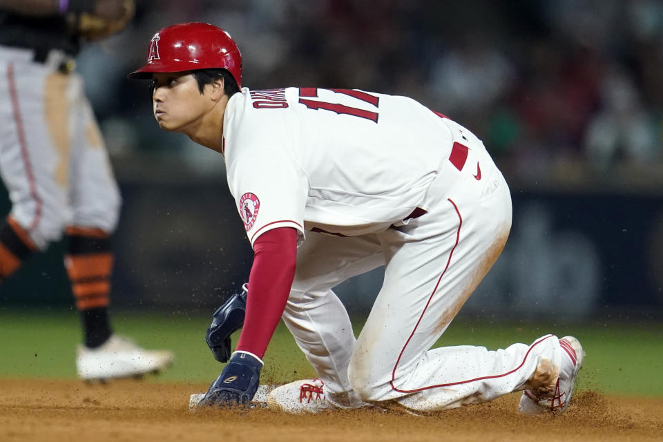 Los Angeles Angels' Shohei Ohtani steals second base during the seventh inning of the team's baseball game against the Baltimore Orioles on Saturday, April 23, 2022, in Anaheim, Calif. (AP Photo/Marcio Jose Sanchez)