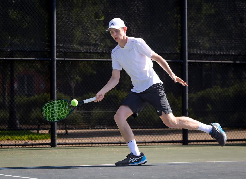 Cascade’s Zach Moore hits the ball during a semifinal match at the OSAA Class 4A/3A/2A/1A tennis state championship at Oregon State University in Corvallis Saturday, May 20, 2023.