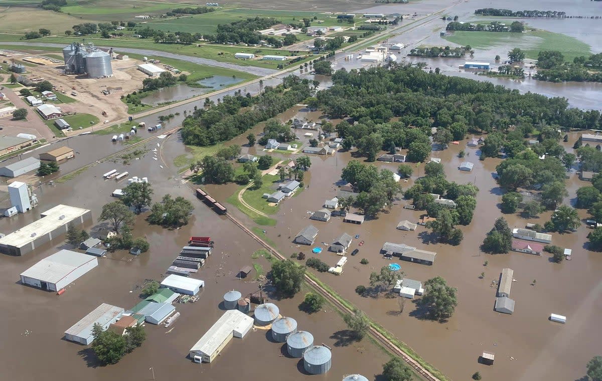 The town of Hawarden, Iowa  pictured as floodwaters rush through the town.  One person is dead in South Dakota as flooding continues in the midwest this week (EPA)