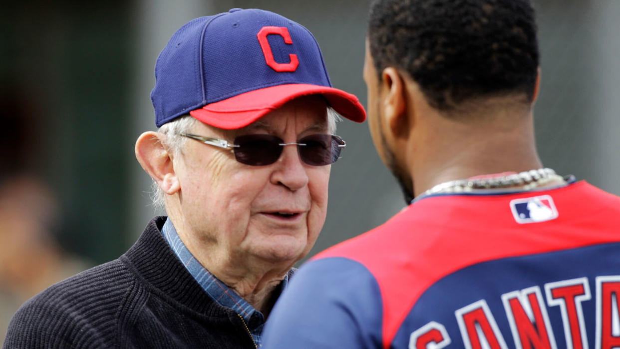 Mandatory Credit: Photo by Mark Duncan/AP/Shutterstock (6292991p)Larry Dolan Cleveland Indians owner Larry Dolan, left, talks with catcher Carlos Santana during baseball spring training, in Goodyear, ArizIndians Spring Baseball, Goodyear, USA.