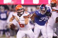 Aug 9, 2018; East Rutherford, NJ, USA; Cleveland Browns quarterback Baker Mayfield (6) scrambles as New York Giants linebacker Jordan Williams (79) pursues during the second half at MetLife Stadium. Vincent Carchietta-USA TODAY Sports