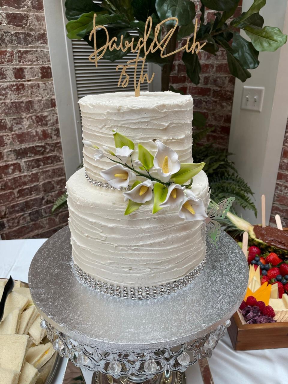 The stunning cake, by Mer Mer’s Bakery on Gay Street, for Zenobia and David Booth’s 75th wedding anniversary celebration at Knoxville High Senior Living. June 12, 2022.