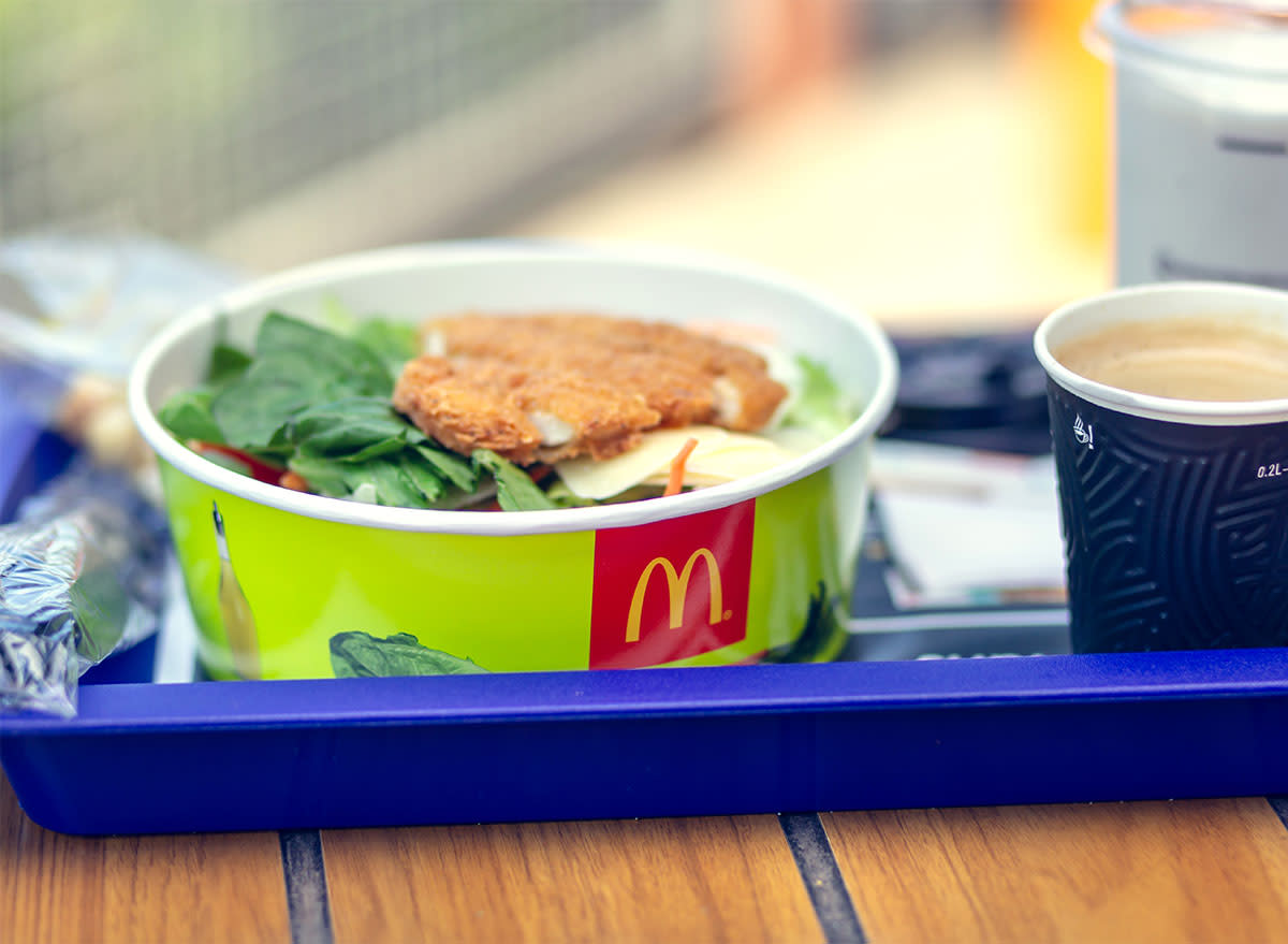 mcdonalds salad and coffee on blue tray