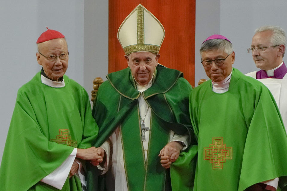 Pope Francis is joined by Cardinal John Tong Hon, left, and Cardinal-elect Stephen Chow, both from Hong Kong, after presiding over a mass at the Steppe Arena in the Mongolian capital Ulaanbaatar, Sunday, Sept. 3, 2023. Francis is in Mongolia to minister to one of the world's smallest and newest Catholic communities. Neighboring China's crackdown on religious minorities has been a constant backdrop to the trip, even as the Vatican hopes to focus attention instead on Mongolia and its 1,450 Catholics. (AP Photo/Ng Han Guan)