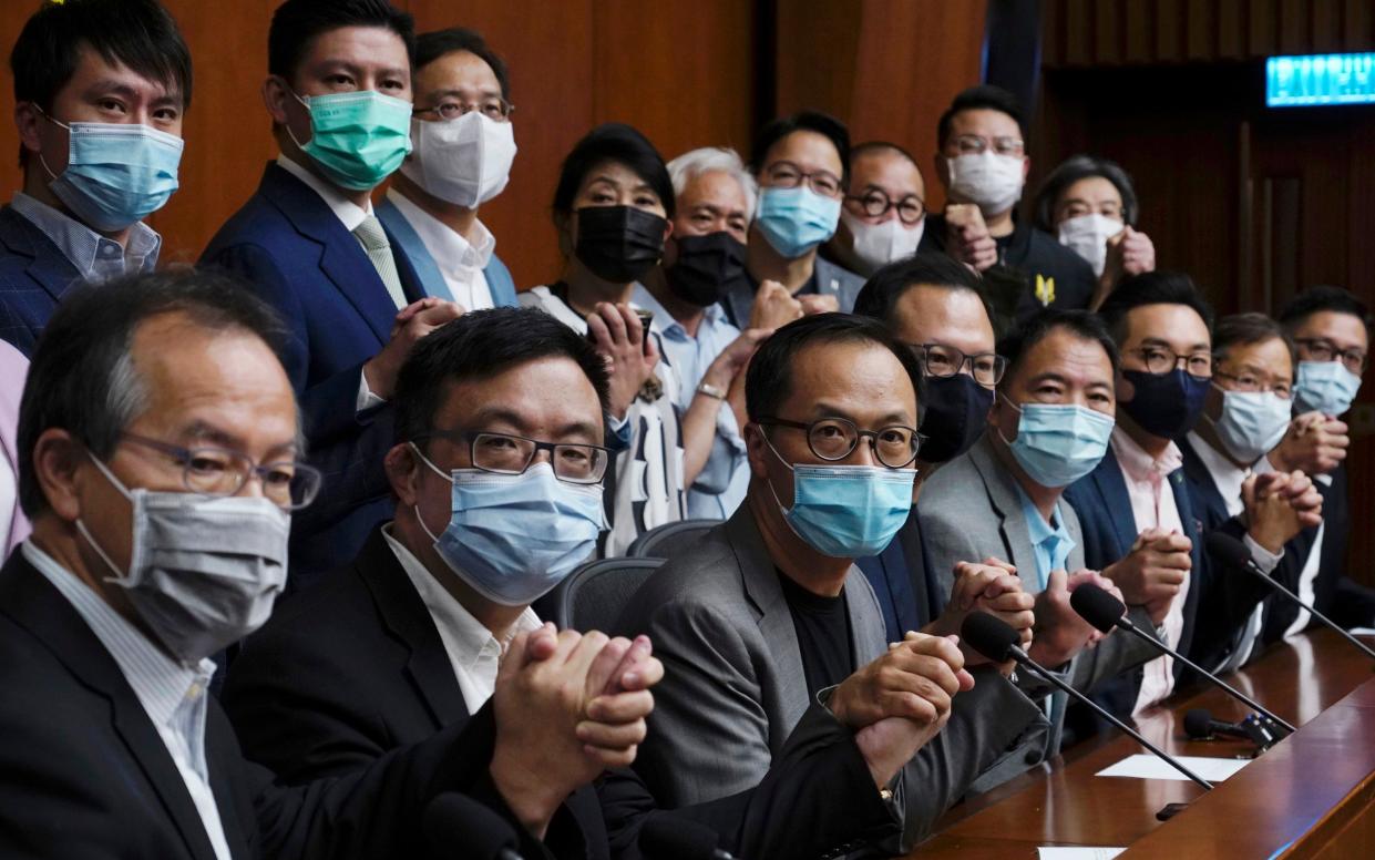 Hong Kong's pro-democracy legislators before a press conference at the Legislative Council - Vincent Yu/AP