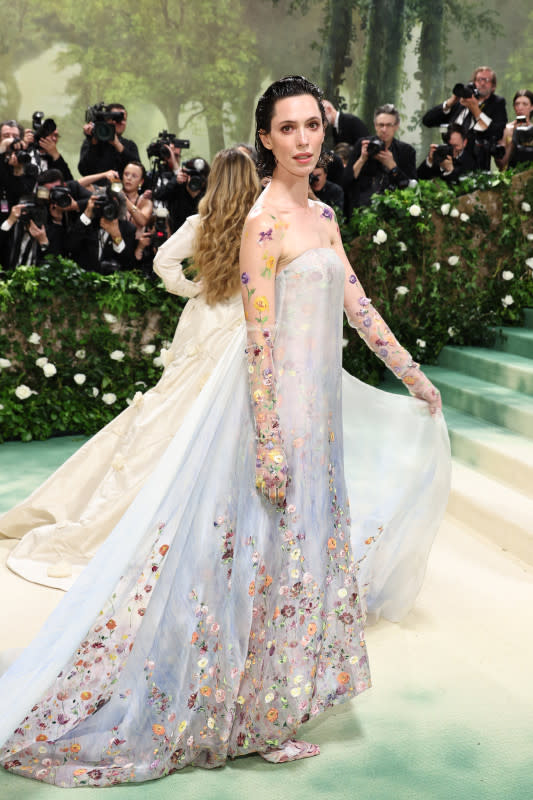 <p>Jamie McCarthy/Getty Images</p><p>The actor and director walked the red carpet in this ghostly floral number in light purple with flowers running up her arms and shoulders. </p>