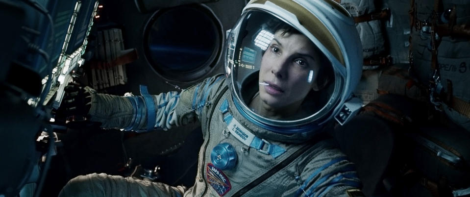 FILE - This film image released by Warner Bros. Pictures shows Sandra Bullock in a scene from "Gravity." Topping the box office for the third straight week, the space adventure “Gravity” continues to be the box-office juggernaut of the fall. The film, starring Sandra Bullock, earned $31 million over the weekend, according to studio estimates Sunday, Oct. 20, 2013. (AP Photo/Warner Bros. Pictures, File)