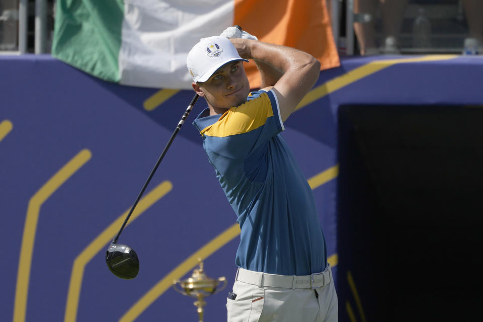 Europe's Ludvig Aberg plays a shot off the 1st tee during his singles match at the Ryder Cup golf tournament at the Marco Simone Golf Club in Guidonia Montecelio, Italy, Sunday, Oct. 1, 2023. (AP Photo/Alessandra Tarantino)