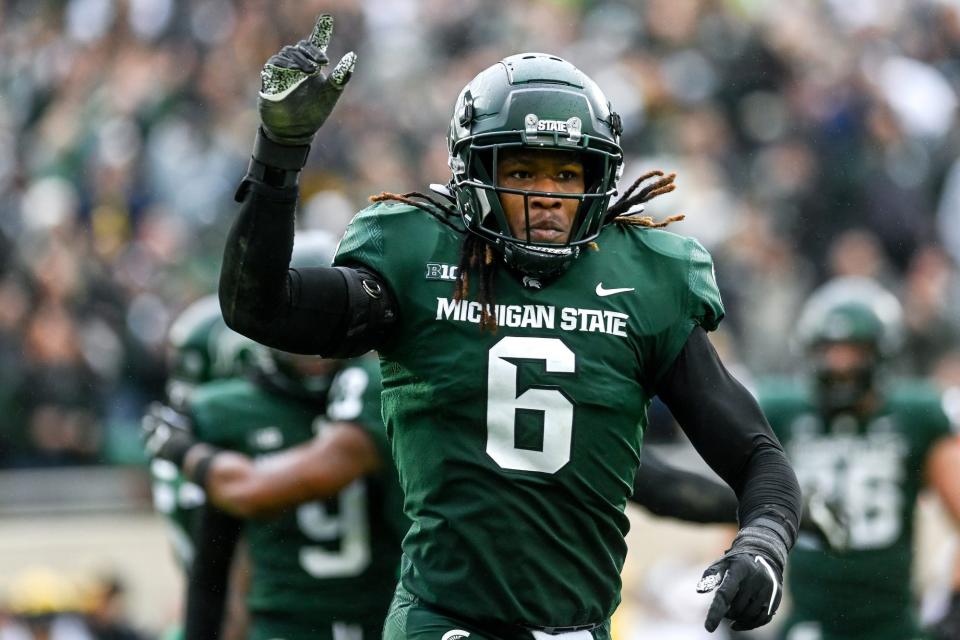 Michigan State's Quavaris Crouch celebrates a stop the fourth quarter against Michigan.