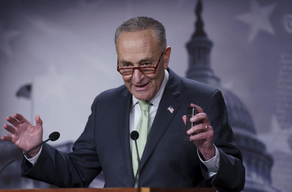 Senate Majority Leader Chuck Schumer, D-N.Y., talks to reporters about the expansive agreement reached with Sen. Joe Manchin, D-W.Va., that they had sought for months on health care, energy and climate issues, and taxes on higher earners and corporations, at the Capitol in Washington, Thursday, July 28, 2022. (AP Photo/J. Scott Applewhite)