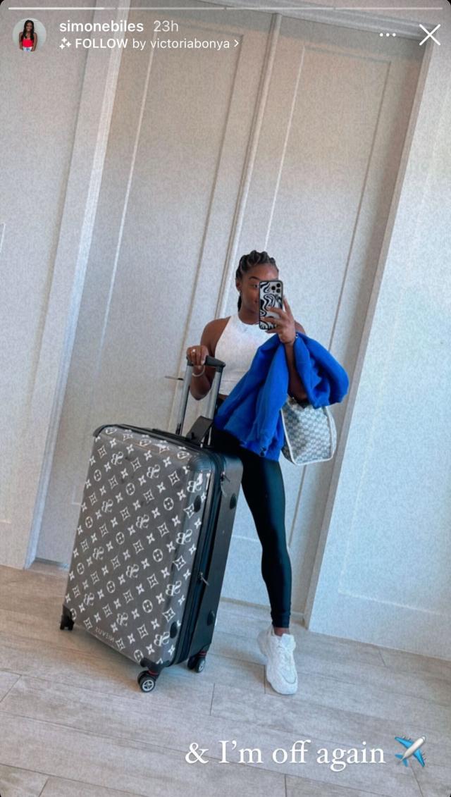 Simone Biles Takes Flight in Crop Top, Leggings & Versatile Dad