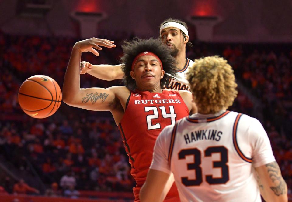 Illinois Fighting Illini guard/forward Jacob Grandison (3) knocks the ball away from Rutgers Scarlet Knights guard Ron Harper Jr. (24)