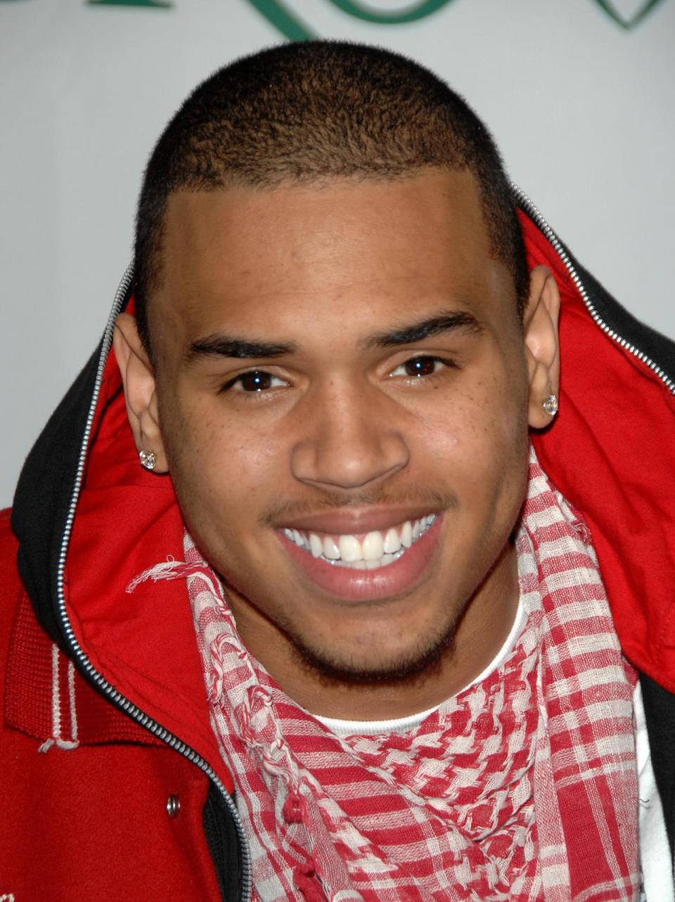 FILE - Singer Chris Brown appears at a news conference to announce his partnership with Ford's Sync, a voice activated hands free in car communication and entertainment system, in this Nov. 2, 2007 file photo taken in New York. Authorities are investigating allegations that Grammy-winning singer Chris Brown assaulted a man in a West Hollywood parking lot Sunday Jan. 27, 2013. (AP Photo/Peter Kramer, File)