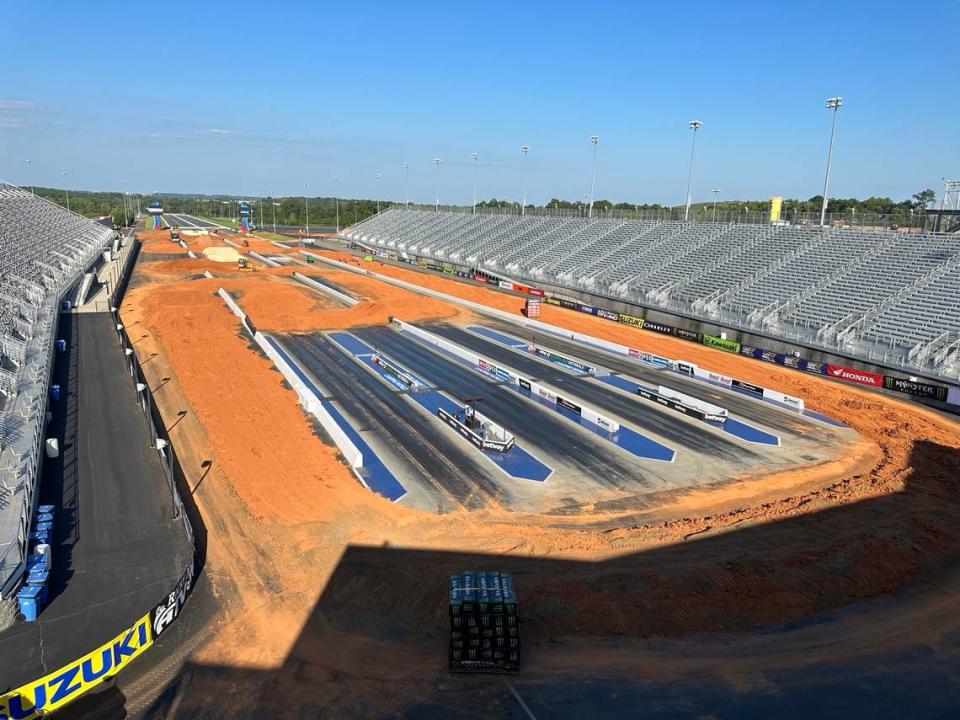 A photo of an almost-transformed zMAX Dragway in Concord, North Carolina, where the country’s two prominent dirt biking series are hosting the inaugural race of the SuperMotocross World Championships.