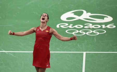 2016 Rio Olympics - Badminton - Women's Singles - Gold Medal Match - Riocentro - Pavilion 4 - Rio de Janeiro, Brazil - 19/08/2016. Carolina Marin (ESP) of Spain celebrates winning her match against P.V. Sindhu (IND) of India. REUTERS/Alkis Konstantinidis