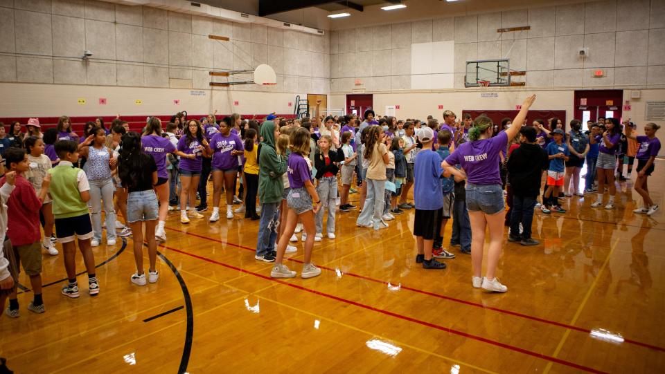 Sixth grade students participate in orientation activities lead by older students at Monroe Middle School on Wednesday in Eugene.