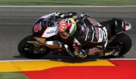 Kalex Moto2 rider Johann Zarco of France takes a curve during the third free practice session of the Aragon Motorcycling Grand Prix at Motorland race track in Alcaniz, northern Spain, September 26, 2015. REUTERS/Marcelo del Pozo