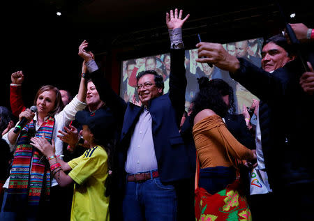 Colombian presidential candidate Gustavo Petro waves to supporters after polls closed in the first round of the presidential election in Bogota, Colombia May 27, 2018. REUTERS/Henry Romero