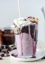 <p>Throw a piece of pie into the blender to create a frothy drink that's as American as well, you know. To make it boozy, add a splash of bourbon. </p><p>Get the <strong><a href="http://www.howsweeteats.com/2016/07/black-raspberry-pie-milkshakes-with-black-raspberry-fudge/" rel="nofollow noopener" target="_blank" data-ylk="slk:Black Raspberry Pie Milkshakes With Black Raspberry Fudge recipe" class="link ">Black Raspberry Pie Milkshakes With Black Raspberry Fudge recipe</a></strong> from How Sweet It Is<em>.</em></p>