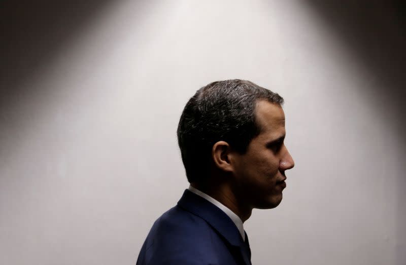 FILE PHOTO: Venezuelan opposition leader Juan Guaido, who many nations have recognised as the country's rightful interim ruler, holds a news conference in Caracas