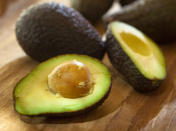 <p><b>Avocados:</b> Avocados are high in monounsaturated fat, which has been shown to help you drop weight, including from your troublesome middle. In one study, people who got the most monos (about 23 percent of their daily calories) had about 5 pounds less belly fat than those who ate a high-carb, lower-fat diet. </p> <p><b>More on SHAPE:</b> <br><a href="http://us.lrd.yahoo.com/_ylt=AmdMrOPw4XkgHEoon_sLQ0NlbqU5;_ylu=X3oDMTFnaXFoZGc2BG1pdANCbG9nUG9zdEJvZHkEcG9zAzcEc2VjA01lZGlhQmxvZ0JvZHlBc3NlbWJseQ--;_ylg=X3oDMTMwbTU2NHBoBGludGwDdXMEbGFuZwNlbi11cwRwc3RhaWQDZWYxZmE2OWEtOWFlMy0zYTU3LWI4YzAtYWRmNDM1NTE5NDRhBHBzdGNhdANoZWFsdGh5bGl2aW5nBHB0A3N0b3J5cGFnZQ--;_ylv=0/SIG=13t0cj00b/EXP=1348124642/**http%3A//www.shape.com/weight-loss/weight-loss-strategies/10-most-misunderstood-diet-and-fitness-strategies" data-ylk="slk:The Medicine Ball Workout: 9 Moves to Tone Every Inch;elm:context_link;itc:0;sec:content-canvas" class="link ">The Medicine Ball Workout: 9 Moves to Tone Every Inch</a> <br><a href="http://us.lrd.yahoo.com/_ylt=Aqy5iNoqViOV.LAxkuWPrHNlbqU5;_ylu=X3oDMTFnc2YwdDZrBG1pdANCbG9nUG9zdEJvZHkEcG9zAzYEc2VjA01lZGlhQmxvZ0JvZHlBc3NlbWJseQ--;_ylg=X3oDMTMwbTU2NHBoBGludGwDdXMEbGFuZwNlbi11cwRwc3RhaWQDZWYxZmE2OWEtOWFlMy0zYTU3LWI4YzAtYWRmNDM1NTE5NDRhBHBzdGNhdANoZWFsdGh5bGl2aW5nBHB0A3N0b3J5cGFnZQ--;_ylv=0/SIG=12f4apq14/EXP=1348124642/**http%3A//www.shape.com/chocolate/what-your-food-cravings-mean" data-ylk="slk:What Your Food Cravings Mean;elm:context_link;itc:0;sec:content-canvas" class="link ">What Your Food Cravings Mean</a> <br><a href="http://us.lrd.yahoo.com/_ylt=AmdMrOPw4XkgHEoon_sLQ0NlbqU5;_ylu=X3oDMTFnaXFoZGc2BG1pdANCbG9nUG9zdEJvZHkEcG9zAzcEc2VjA01lZGlhQmxvZ0JvZHlBc3NlbWJseQ--;_ylg=X3oDMTMwbTU2NHBoBGludGwDdXMEbGFuZwNlbi11cwRwc3RhaWQDZWYxZmE2OWEtOWFlMy0zYTU3LWI4YzAtYWRmNDM1NTE5NDRhBHBzdGNhdANoZWFsdGh5bGl2aW5nBHB0A3N0b3J5cGFnZQ--;_ylv=0/SIG=13t0cj00b/EXP=1348124642/**http%3A//www.shape.com/weight-loss/weight-loss-strategies/10-most-misunderstood-diet-and-fitness-strategies" data-ylk="slk:The 10 Most Misunderstood Diet and Fitness Strategies;elm:context_link;itc:0;sec:content-canvas" class="link ">The 10 Most Misunderstood Diet and Fitness Strategies </a></p>