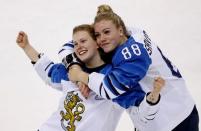 Ice Hockey - Pyeongchang 2018 Winter Olympics - Women's Bronze Medal Match - Finland v Olympic Athletes from Russia - Kwandong Hockey Centre, Gangneung, South Korea - February 21, 2018 - Noora Tulus and Ronja Savolainen of Finland celebrate after the match. REUTERS/Kim Kyung-Hoon