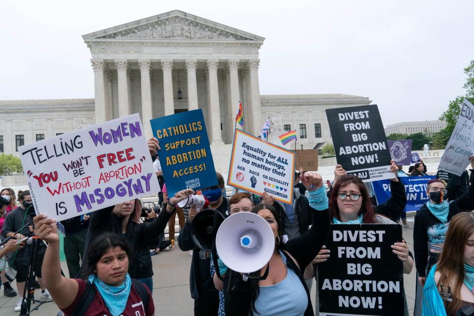 Demonstrators protest outside of the U.S. Supreme Court Tuesday, May 3, 2022 in Washington. A draft opinion suggests the U.S. Supreme Court could be poised to overturn the landmark 1973 Roe v. Wade case that legalized abortion nationwide, according to a Politico report released Monday. Whatever the outcome, the Politico report represents an extremely rare breach of the court's secretive deliberation process, and on a case of surpassing importance. (AP Photo/Jose Luis Magana)