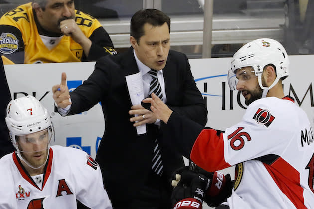 Ottawa Senators head coach Guy Boucher gives instruction to Clarke MacArthur (16) during the third period of Game 1 of the Eastern Conference final in the NHL Stanley Cup hockey playoffs in Pittsburgh, Saturday, May 13, 2017. (AP Photo/Gene J. Puskar)