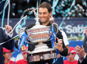 Tennis - Barcelona Open Final - Rafael Nadal of Spain v Dominic Thiem of Austria - Real Club de Tenis Barcelona, Spain - 30/04/17 - Rafael Nadal raises up the trophy. REUTERS/Albert Gea