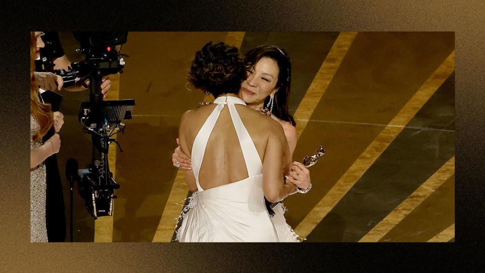 Michelle Yeoh accepts the Best Actress award for Everything Everywhere All at Once from Jessica Chastain and Halle Berry onstage during the 95th Annual Academy Awards at Dolby Theatre on March 12, 2023 in Hollywood, California.