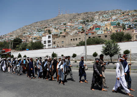 Afghan peace marchers arrive in Kabul, Afghanistan June 18, 2018. REUTERS/Mohammad Ismail