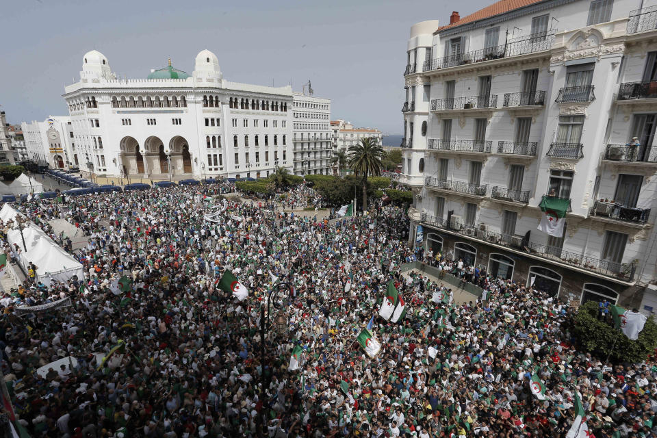 Algerian protesters gather during an anti-government demonstration in the centre of the capital Algiers, Algeria, Friday, June 7, 2019. (AP Photo/Toufik Doudou)