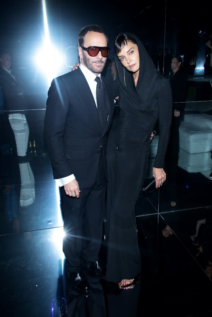 Katie Holmes and Tom Ford pose together at Ford’s Spring 2023 fashion show at Skylight on Vesey in New York City during New York Fashion Week on Sept. 14, 2022. - Credit: Photo by Dimitrios Kambouris/Getty Images for NYFW: The Shows