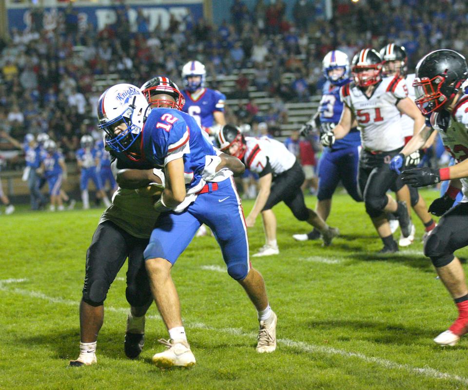 West Holmes quarterback Morgan Smith proved to be a force with his legs as well as his arm, running for 126 and two touchdowns, and throwing for 347 yards and three touchdowns to lift the Knights over Orrville 35-31.