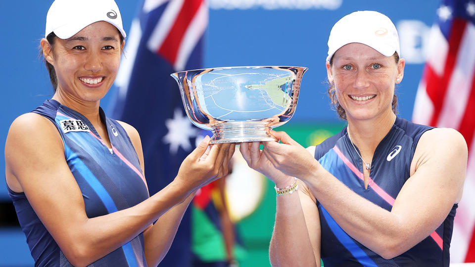 Zhang Shuai and Sam Stosur, pictured here with the championship trophy after the US Open final.