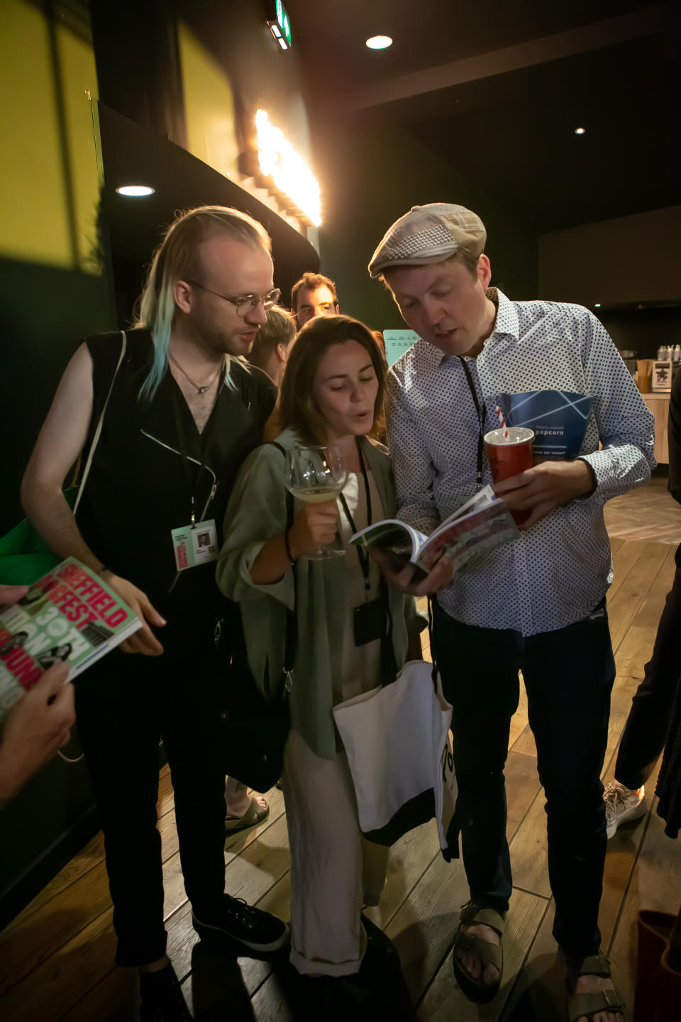 Sheffield attendees consult the festival program