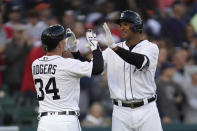 Detroit Tigers' Jonathan Schoop, right, celebrates his three-run home run with Jake Rogers (34) in the fourth inning of a baseball game against the St. Louis Cardinals in Detroit, Tuesday, June 22, 2021. (AP Photo/Paul Sancya)