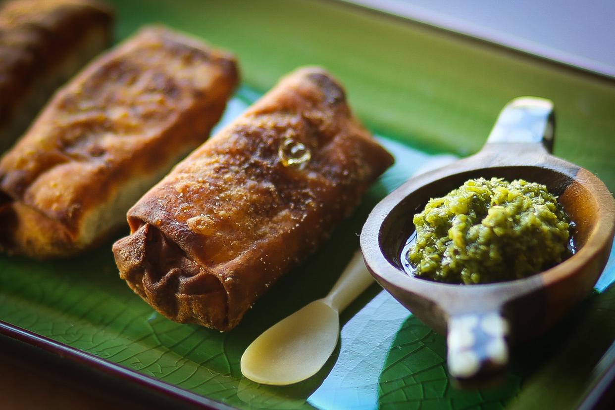 At Queen of Sheeba, "sambusa" pastries stuffed with a choice of lentil or meat and served with spicy cilantro-jalapeno sauce. The full-service Ethiopian restaurant owned by chef Lojo Washington is in West Palm Beach's Northwest Historic District.