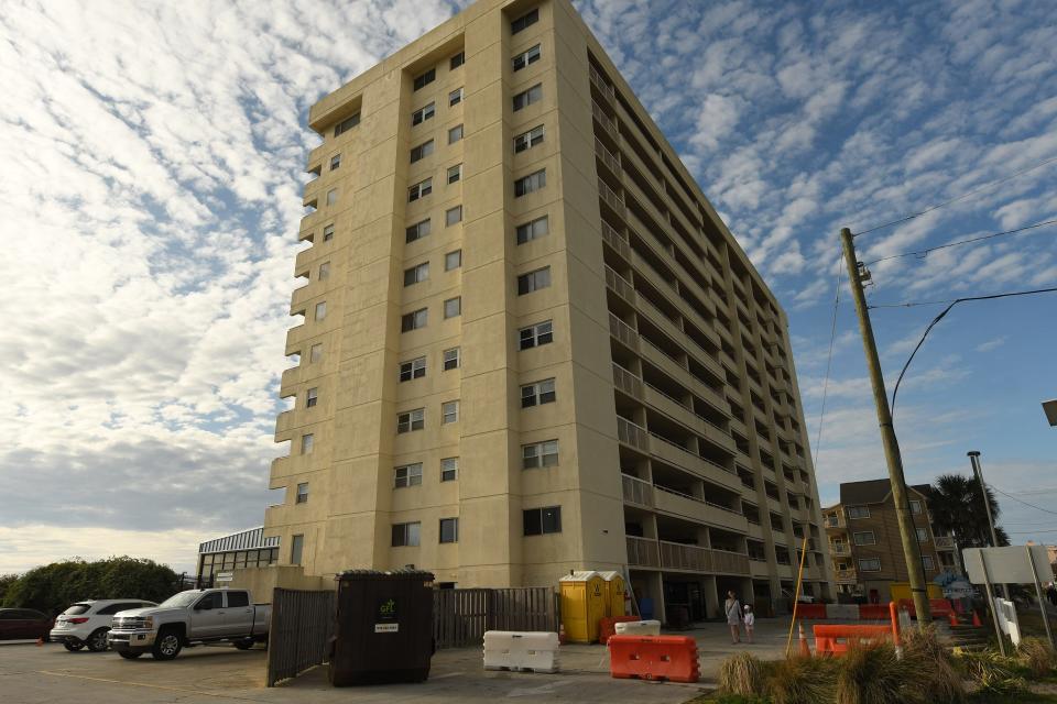 Construction still continues around Pelican Watch Tuesday April 12, 2022 the condos in Carolina Beach closed abruptly last August, cancelling reservations, for stairway repairs.[KEN BLEVINS/STARNEWS]
