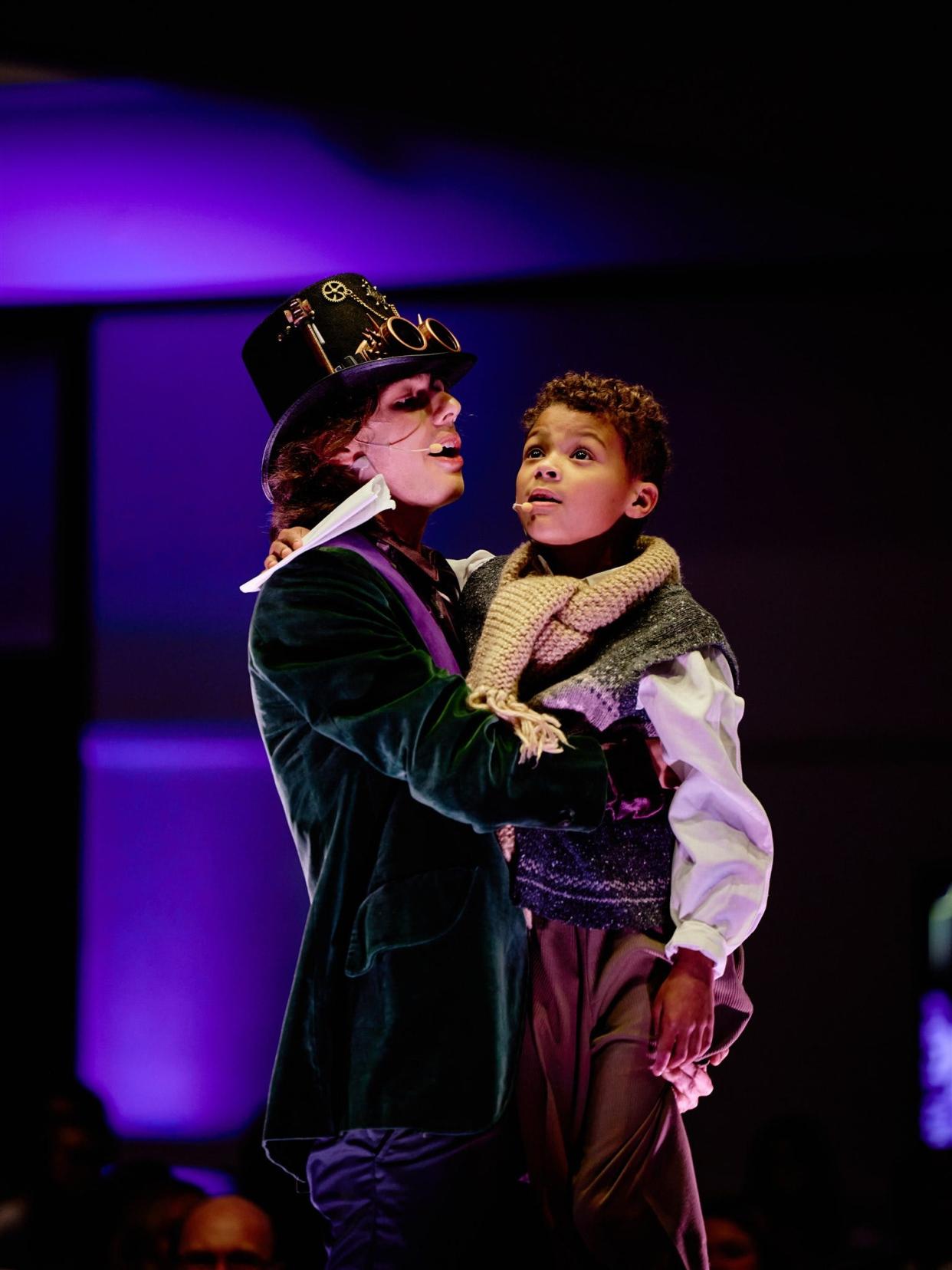 Justin Meacham, left, plays Willy Wonka and Titus Badertscher is one of the actors who plays Charlie Bucket in South Bend Civic Theatre's production of "Charlie and the Chocolate Factory" that opens Oct. 13 and continues through Oct. 29, 2023. Teddy Harshman also plays Charlie.